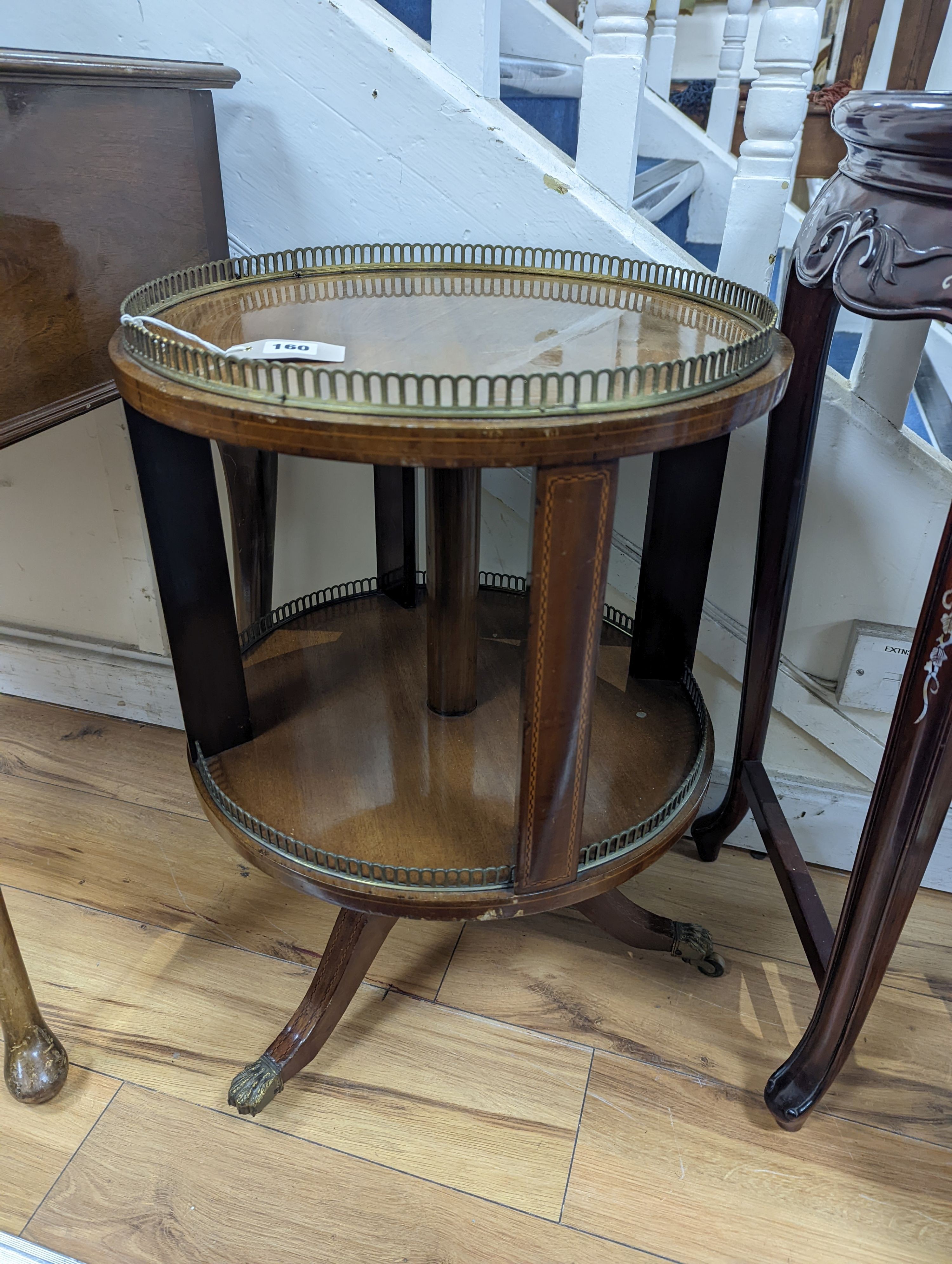 A Regency style circular mahogany revolving galleried bookcase, diameter 45cm, height 65cm